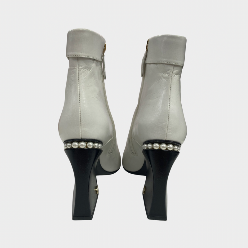 Chanel women's white leather boots with pearl heel details