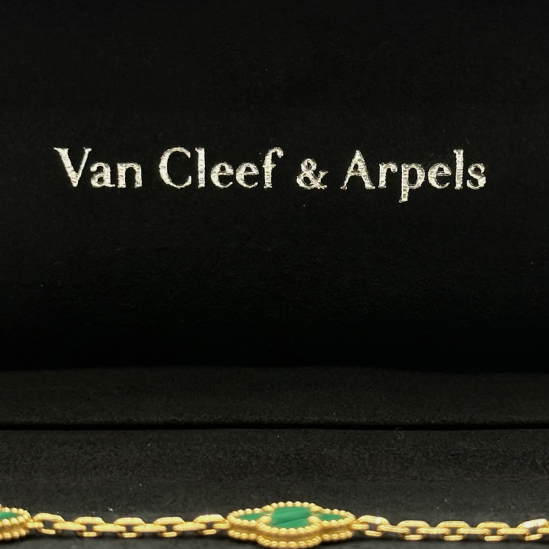 Van Cleef & Arpels 18K yellow gold and Malachite Magic Alhambra bracelet