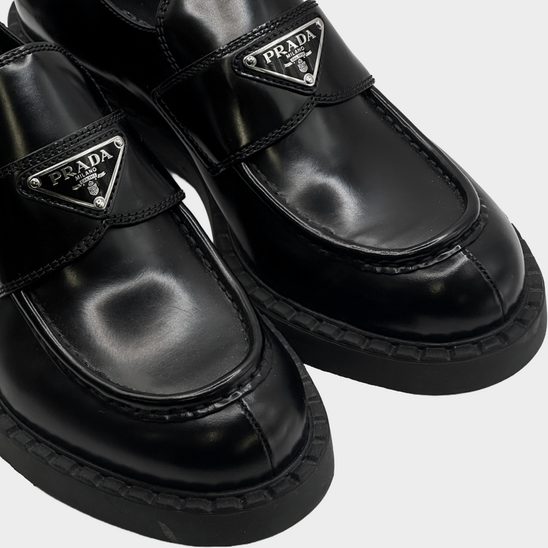 Prada women's black leather logo platform loafers