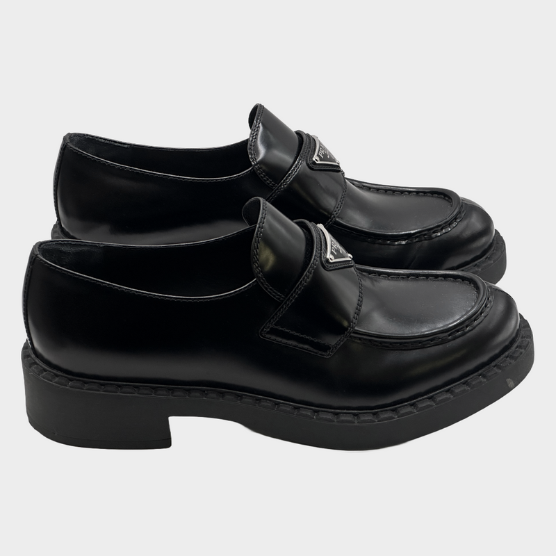 Prada women's black leather logo platform loafers