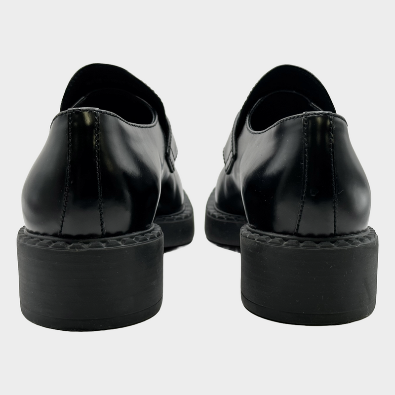 Prada women's black leather logo platform loafers