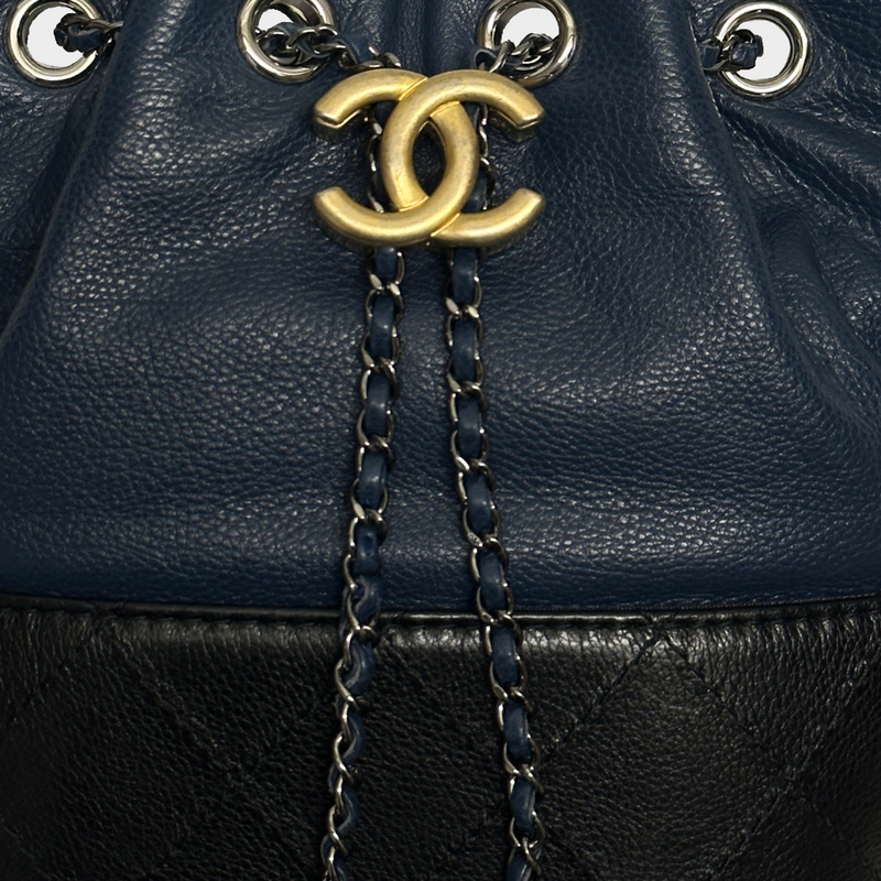 Chanel women's black and petrol grained lambskin leather Gabrielle bucket crossbody bag