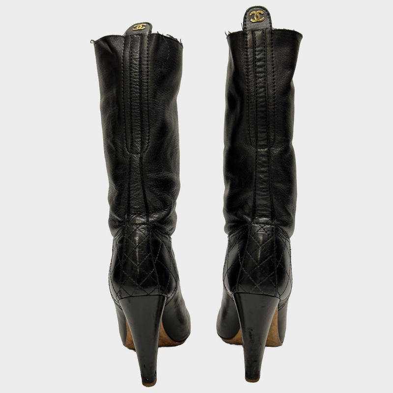 Chanel women's black leather heeled boots