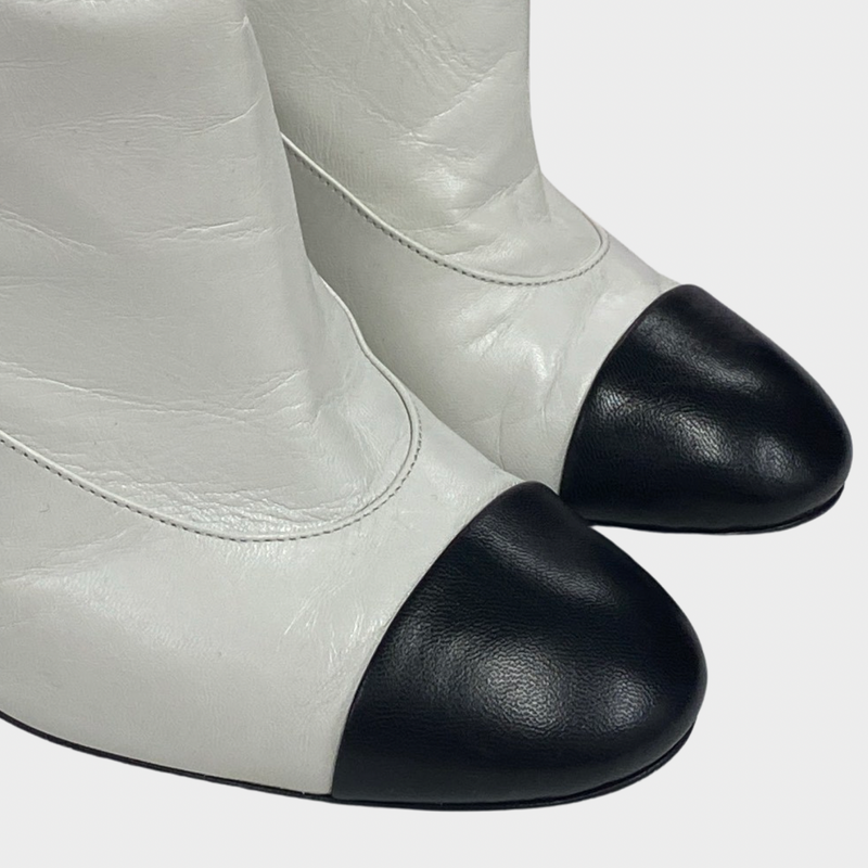 Chanel women's white leather boots with pearl heel details