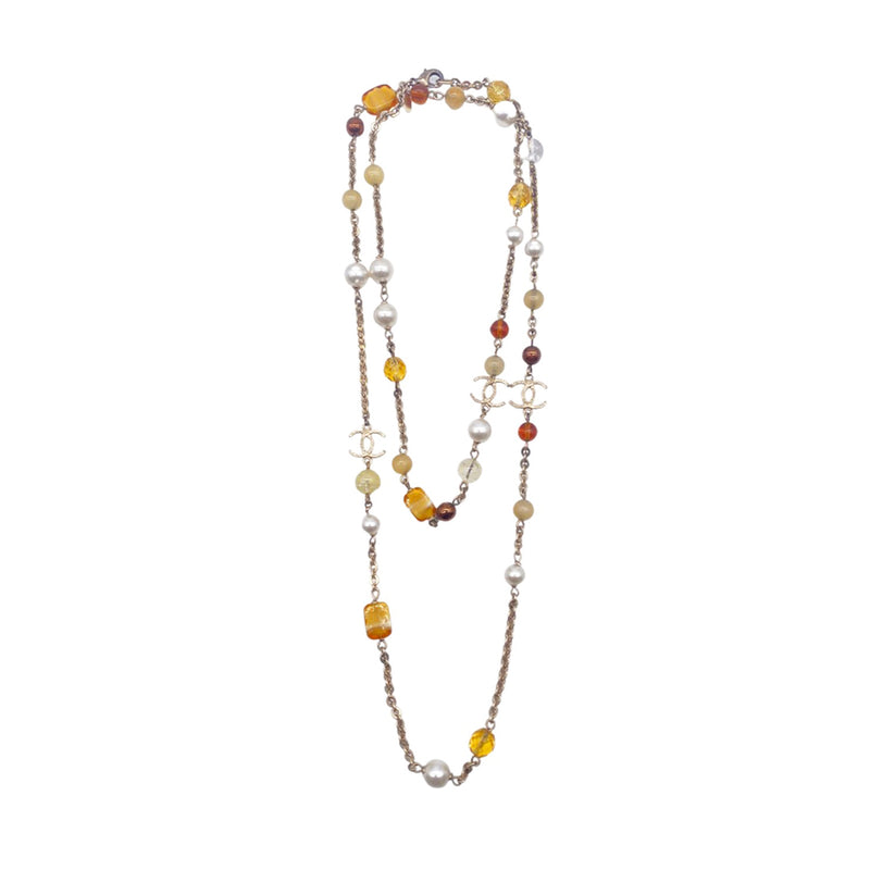 pre-owned CHANEL CC amber and pearl necklace