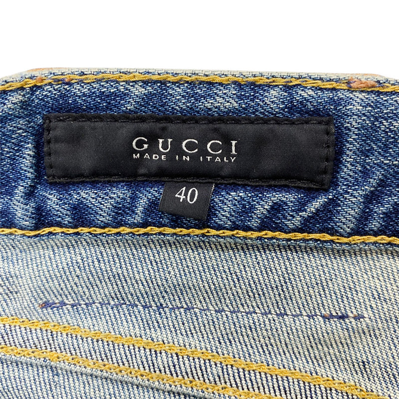 GUCCI blue distressed jeans