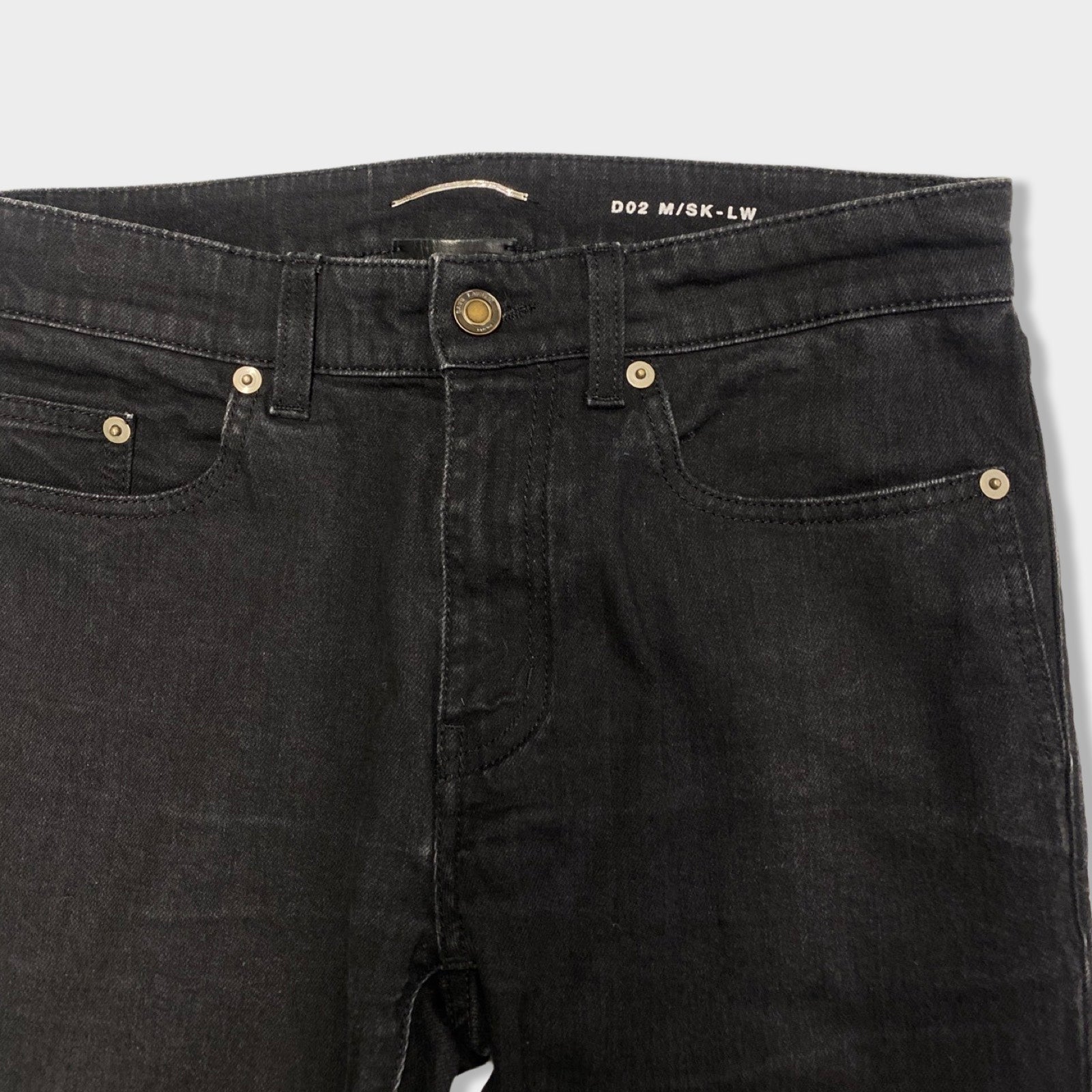 Saint laurent hotsell black distressed jeans