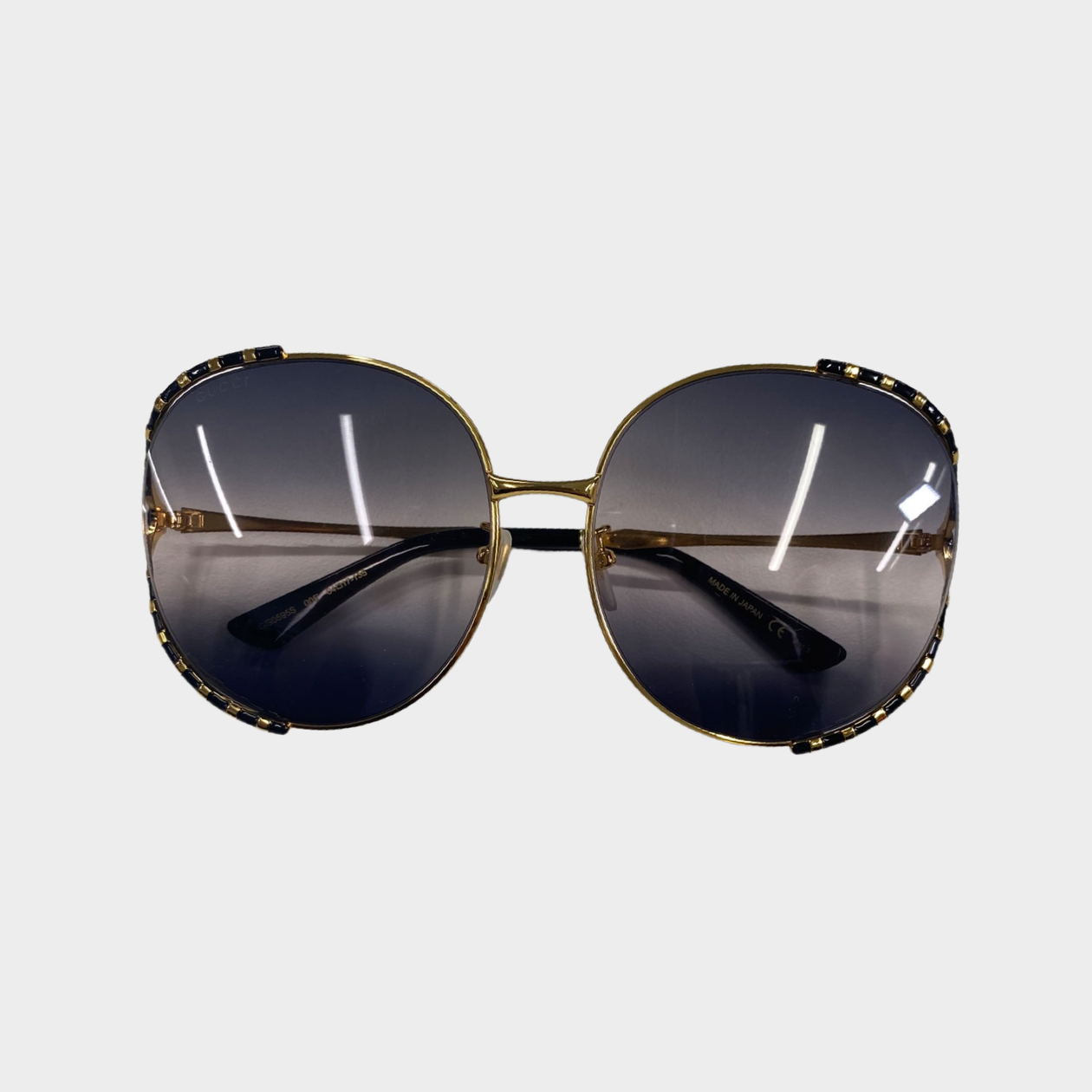 Gucci sunglasses best sale with gold trim