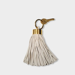 pre-owned TOM FORD ecru leather tassel keychain with gold key detailTOM FORD ecru leather tassel keychain with gold key detail