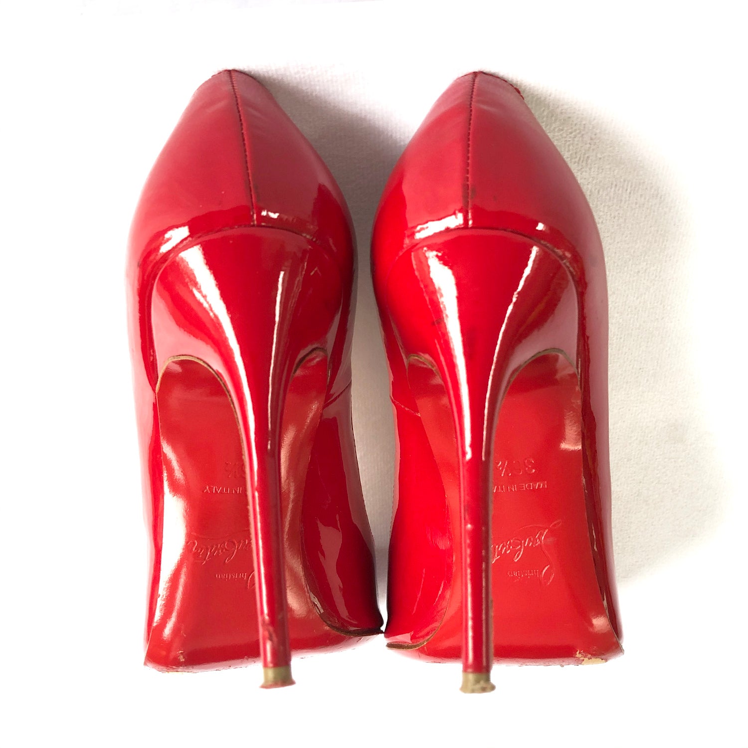 Christian louboutin best sale red pumps